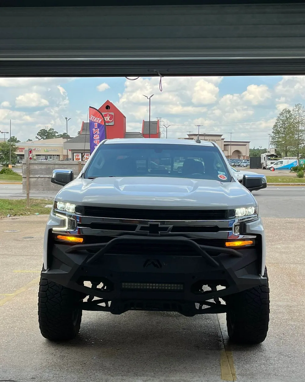 Vehicle at State Inspection King service bay